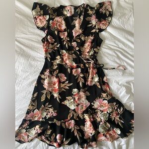 Little black dress with flowers. Knee length, size L women’s